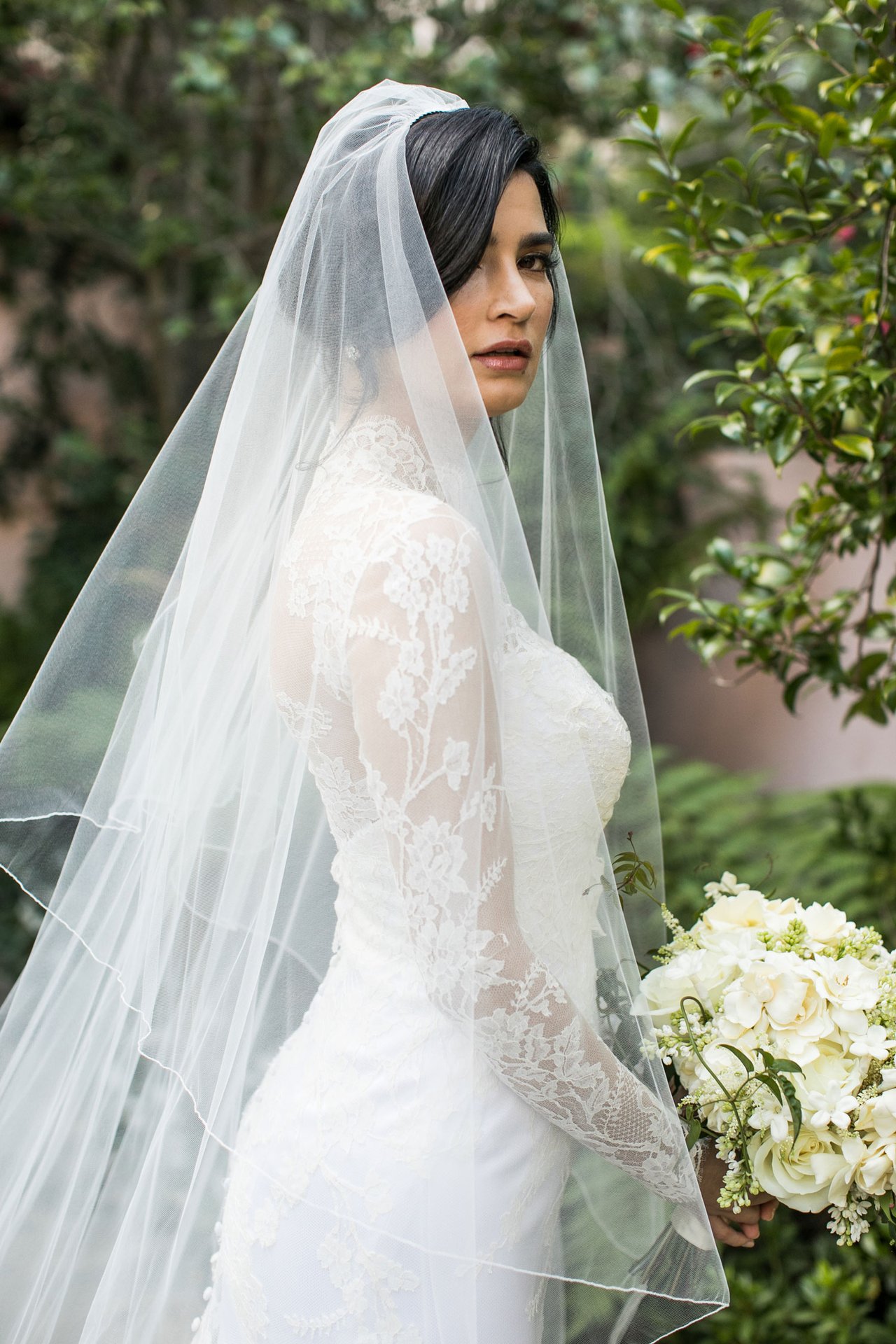 Bride Wearing Veil & LongSleeve Gown