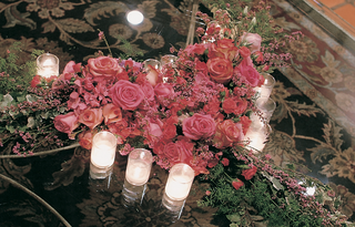 Pink Roses in Heart Shape votive-candles-and-pink-rose-heart-on-table