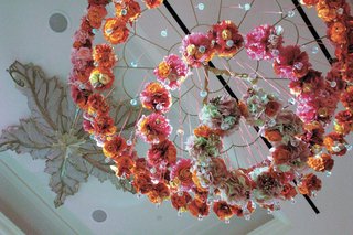 Ceiling Floral Sculpture pink-and-orange-flower-rings-hung-from-ceiling