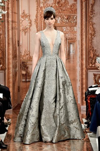 "Margaret" by THEIA margaret-by-theia-spring-2019-champagne-brocade-ball-gown-baroque-embroidery-and-plunging-neckline