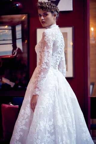"Amparo" by Isabelle Armstrong isabelle-armstrong-fall-2018-wedding-dress-amparo-long-sleeve-ball-gown-flower-embroidery-buttons