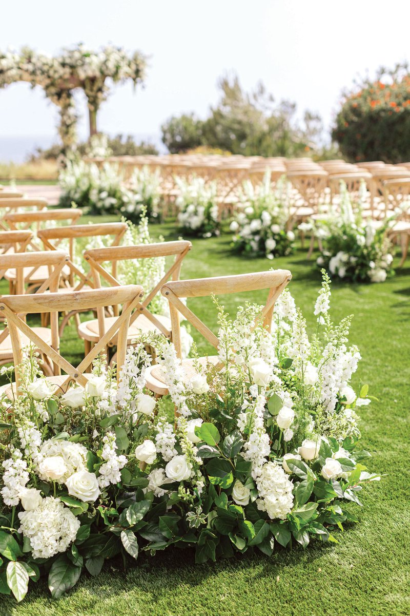 White Flowers & Greenery at Ceremony