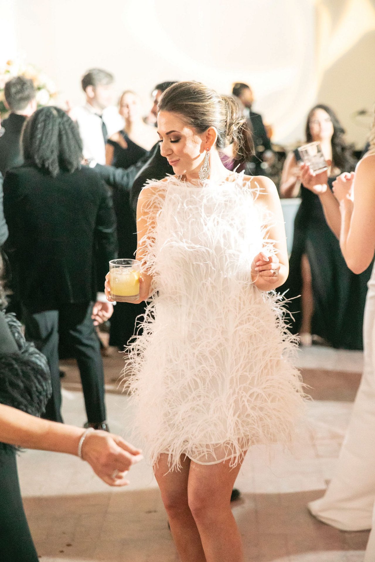 Bride in Feather Minidress at After-Party