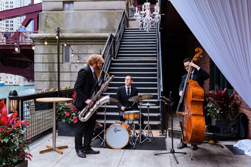 Jazz Cocktail Trio Playing on the Riverwalk at Fulton&#39;s on the River