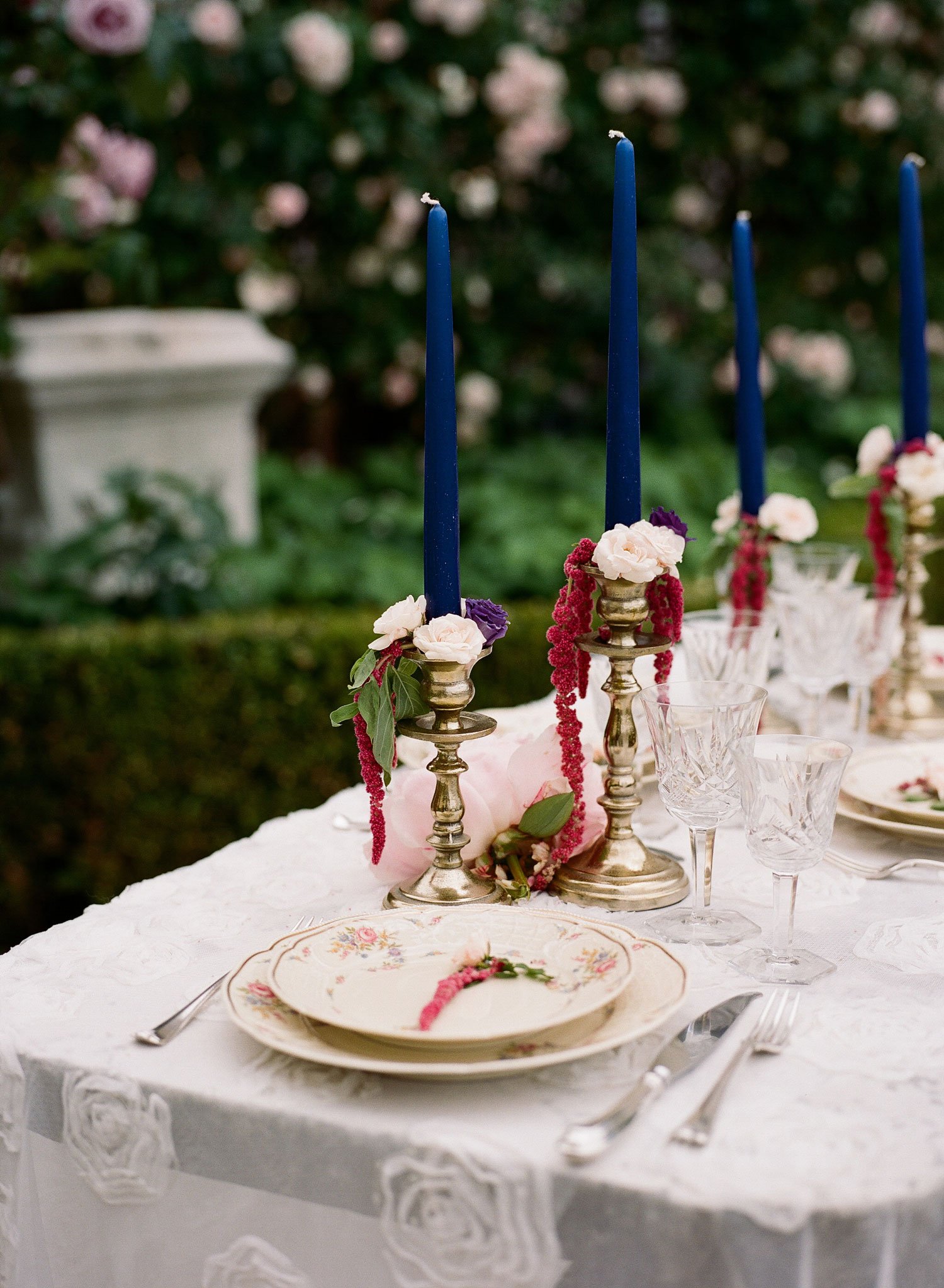 Blue Taper Candles on Table