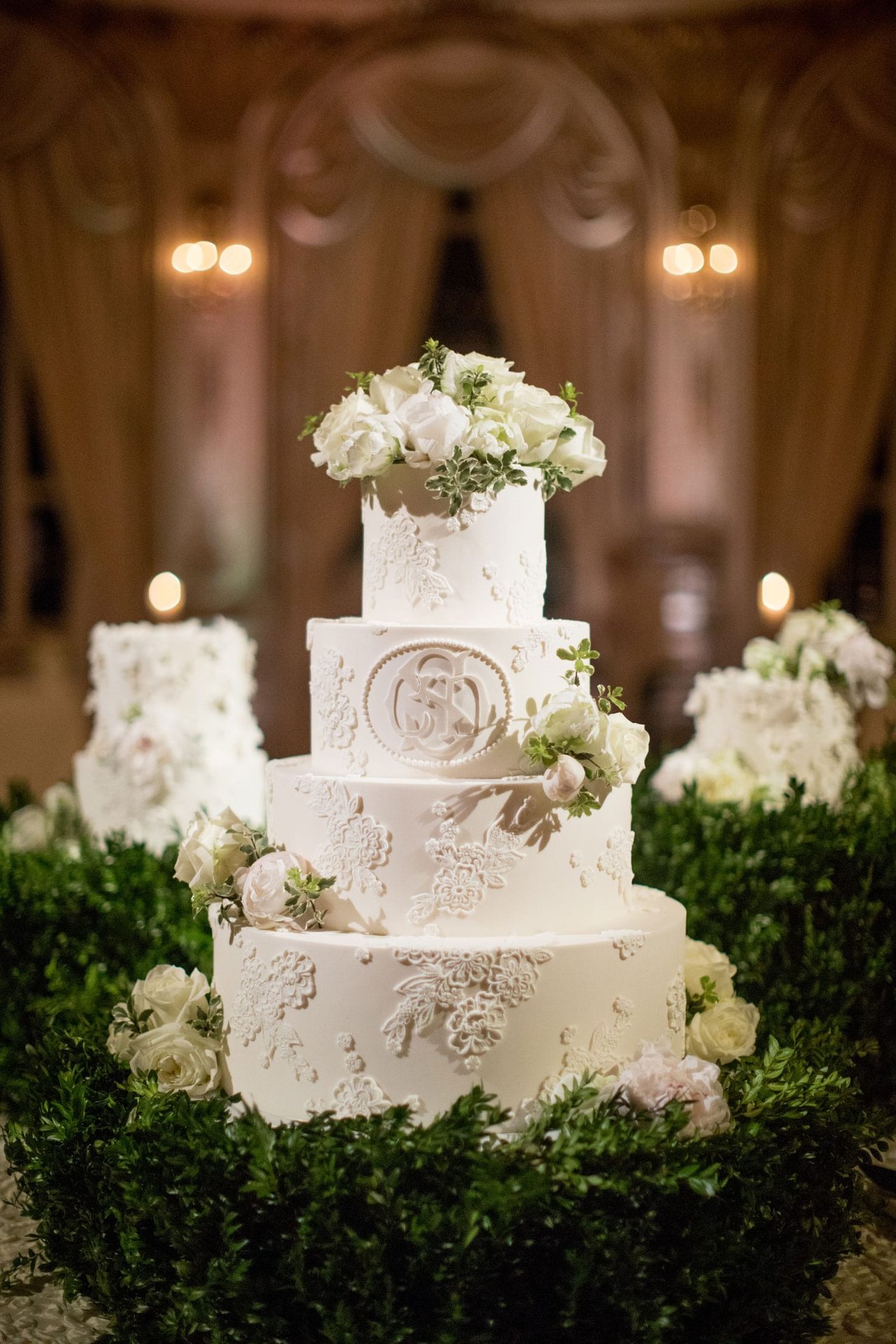 Three Wedding Cakes at Reception