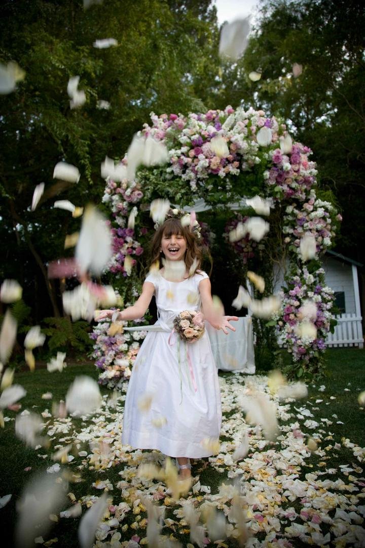 Flower Girl Throwing Petals