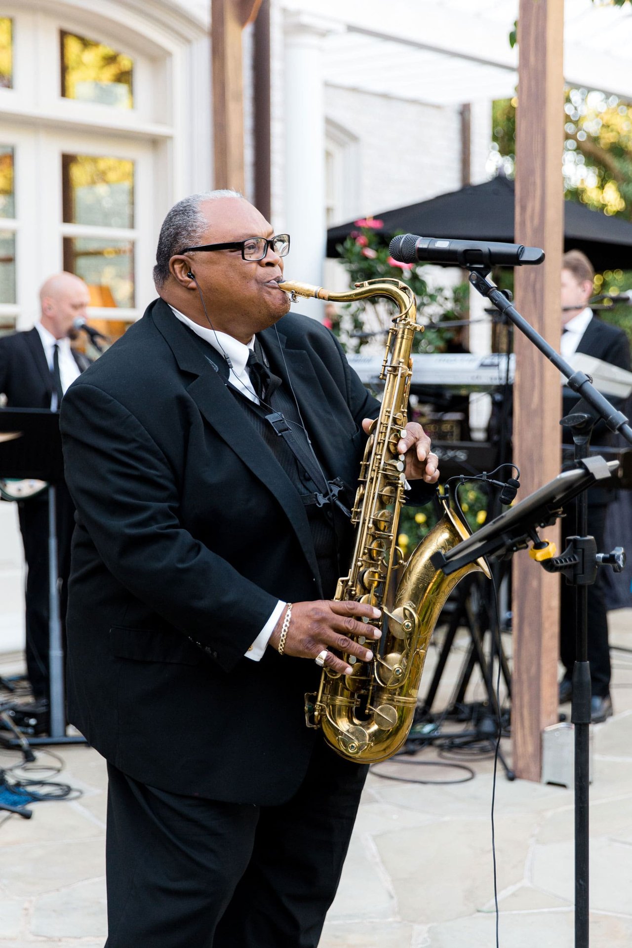 Saxophone Player at Backyard Wedding