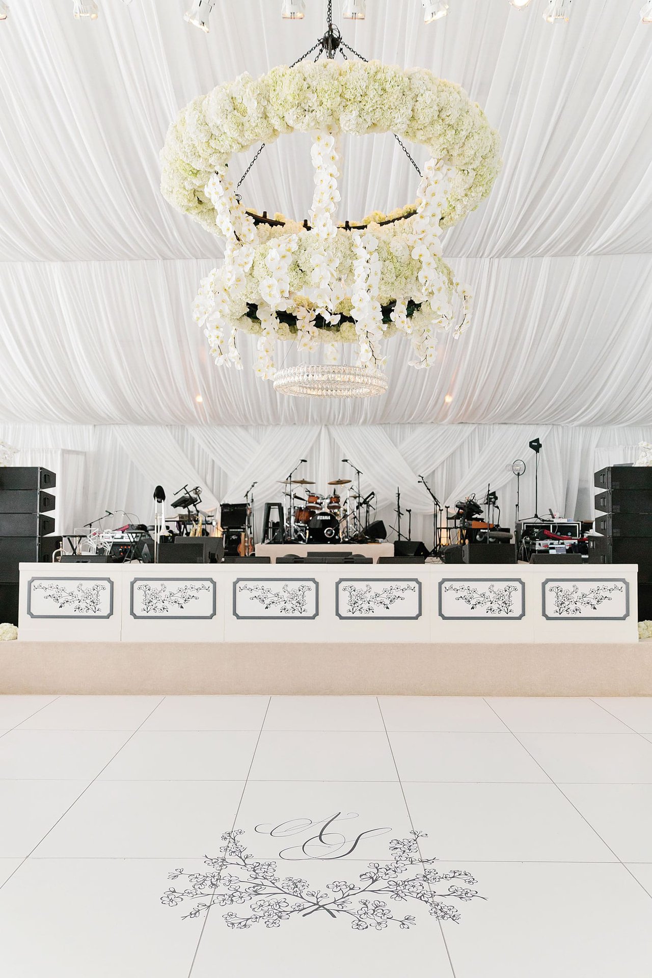 Floral Chandelier Over Monogram Dance Floor