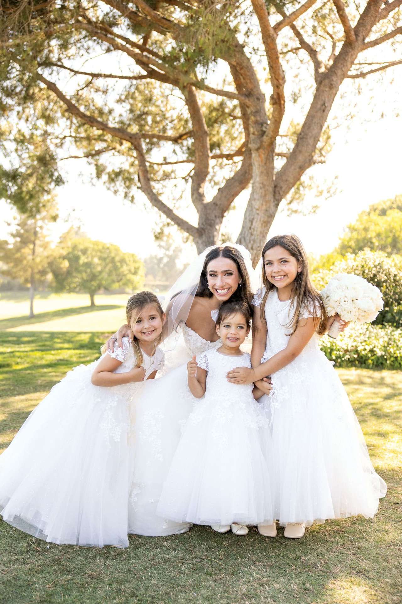 Bride with Three Flower Girls in Princess Dresses