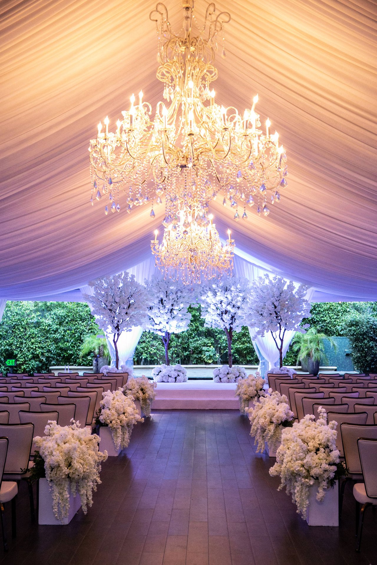 Chandeliers & White Florals at Ceremony