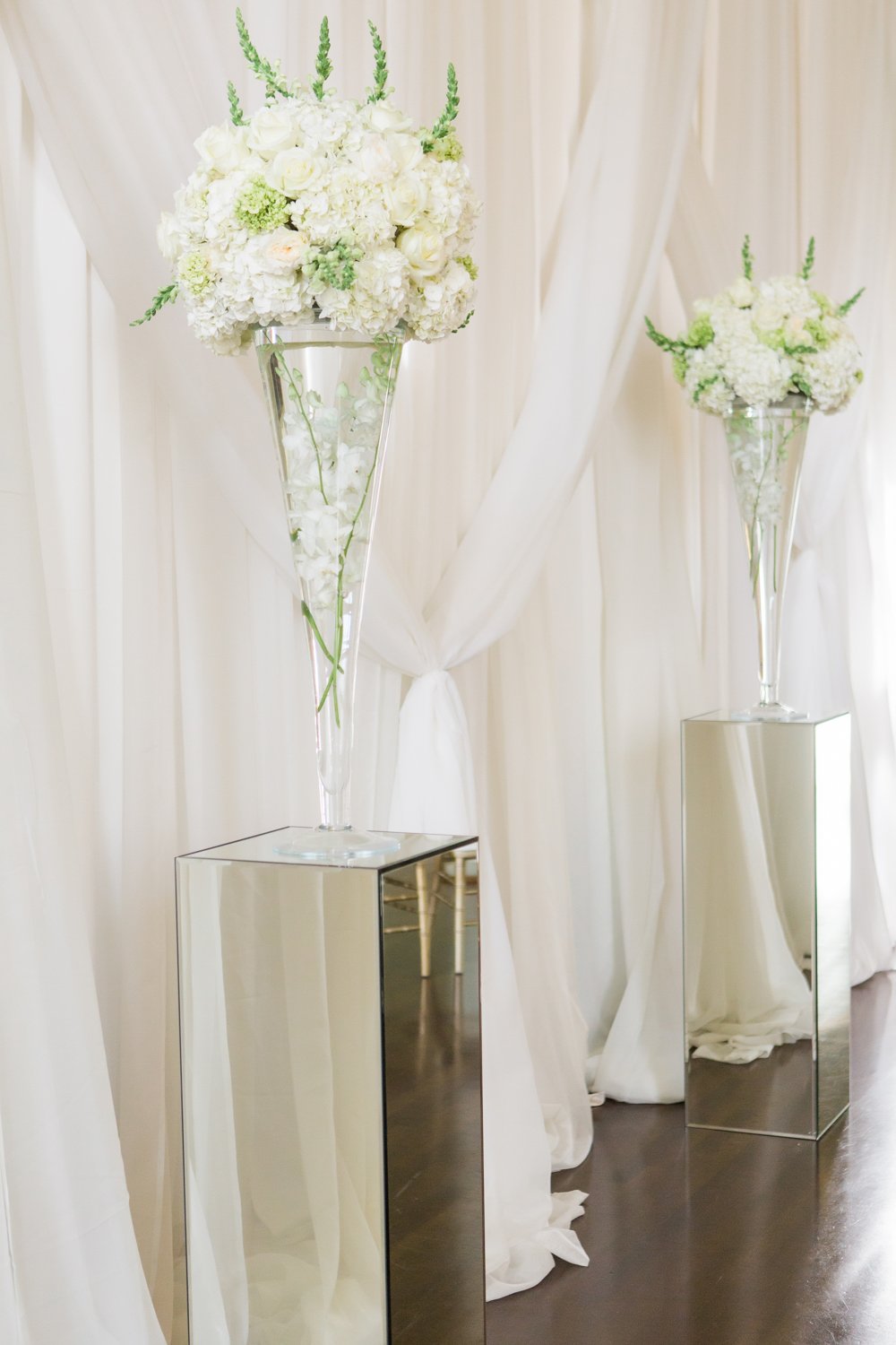 Vases on Mirrored Risers