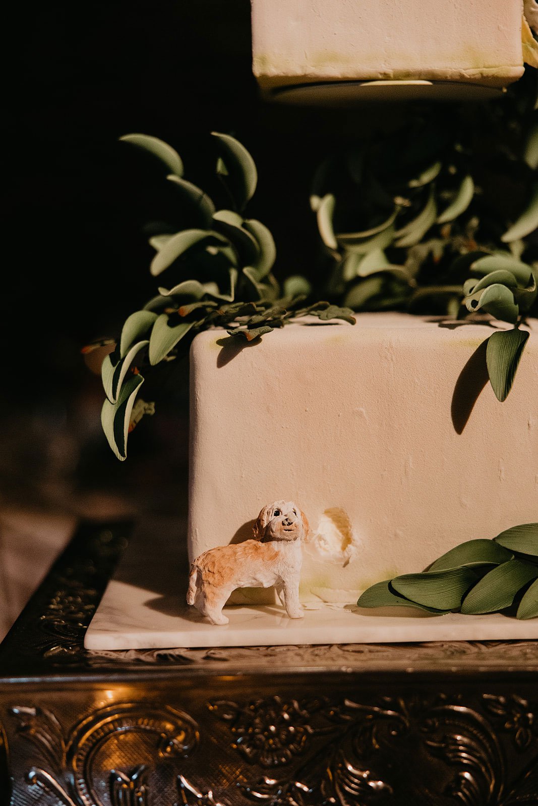 Wedding Cake Detail of Dog Eating Cake