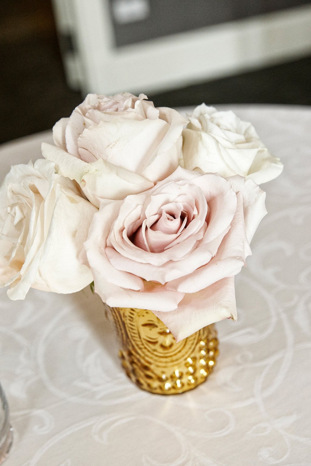 Roses in a Small Gold Vase