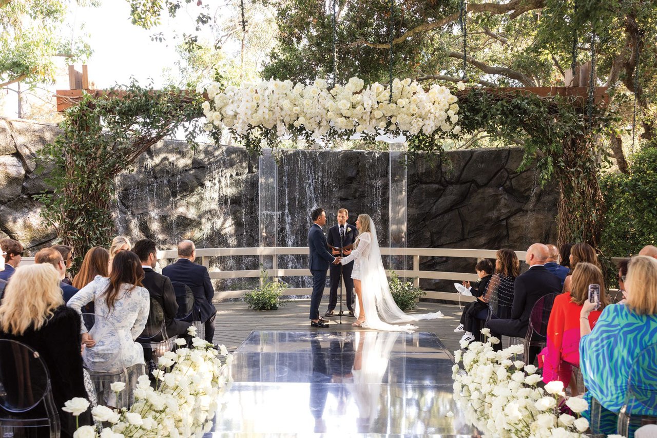Outdoor Ceremony in Front of Waterfall