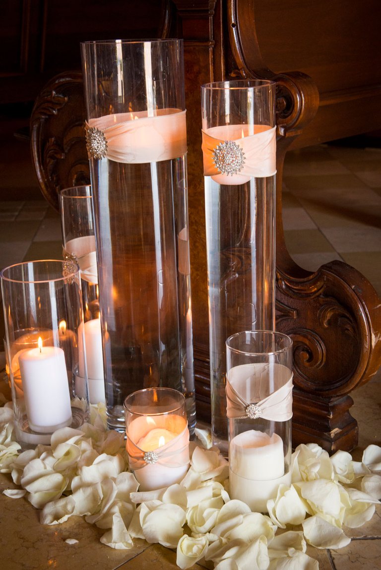 Candles at the Base of Chapel Pew