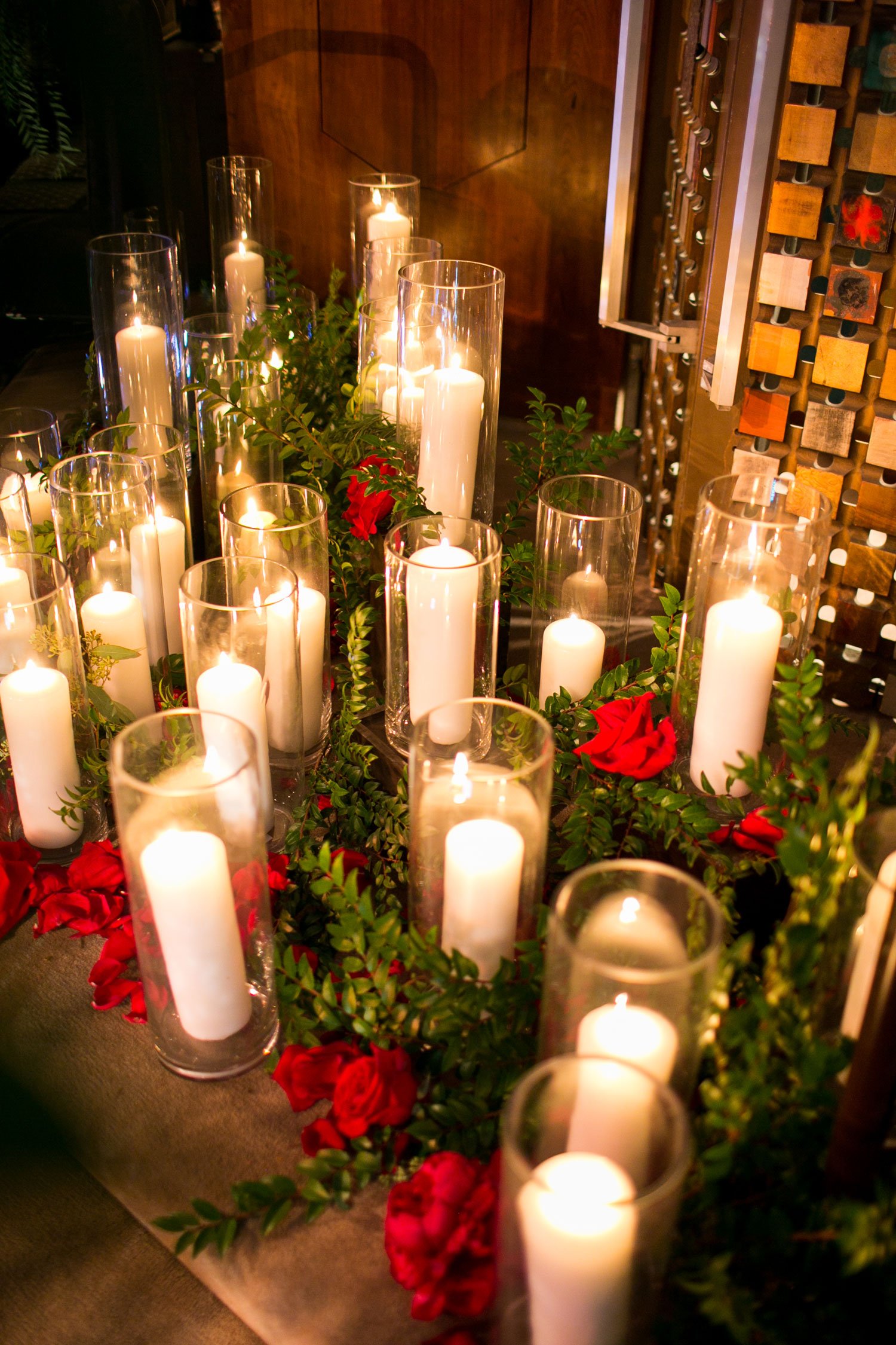 Candles in Hurricane Vases with Greenery