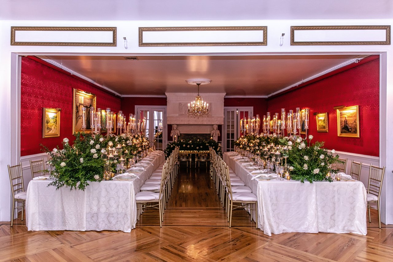 Red Reception Room with Greenery Décor