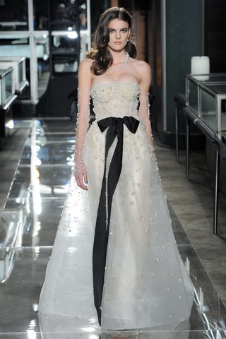 "Pearl" by Reem Acra reem-acra-spring-2018-bridal-designer-pearl-embellished-strapless-ball-gown-black-ribbon-crystals