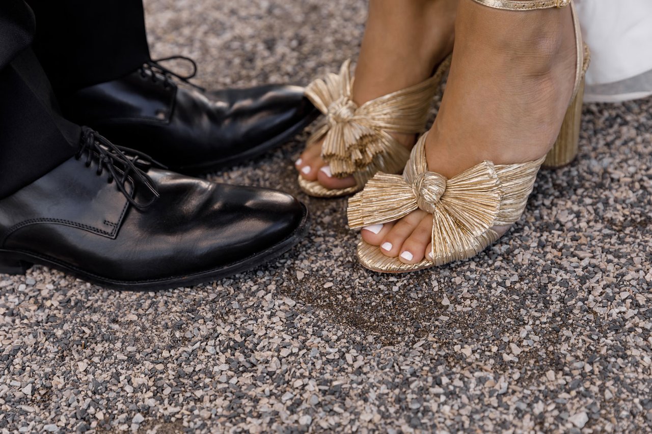 Bride in Gold Shoes with White Pedicure