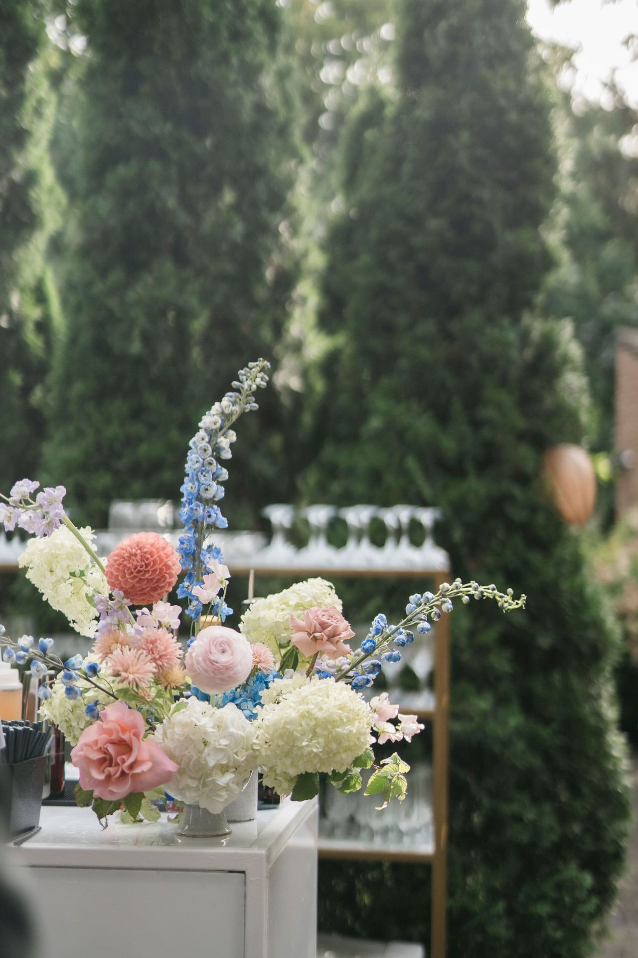 Pastel Wedding Flowers at Outdoor Bar Pastel Wedding Flowers at Outdoor Bar