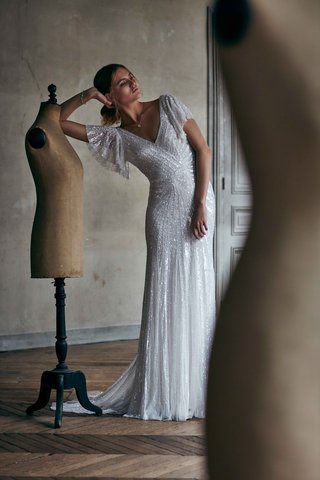 "Cibella" BHLDN Gown cibella-eliza-jane-howell-bhldn-sparkle-wedding-dress-with-v-neck-beading-and-flutter-sleeves
