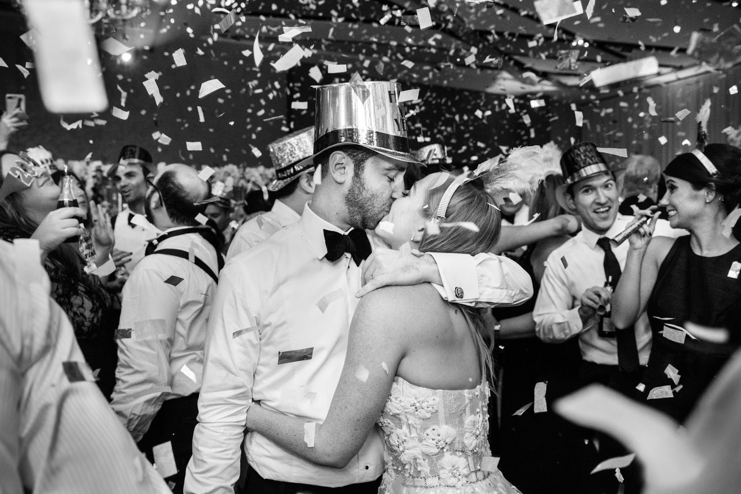 confetti explosion on New Year's Eve for NYE wedding reception