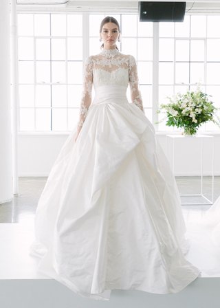 High-Neckline Ball Gown, Illusion Details by Marchesa Bridal marchesa-bridal-spring-summer-2018-ball-gown-high-neck-illusion-sleeves-floral-wrap-waist-big-skirt
