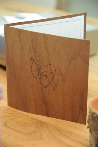 Monogrammed Wood-Grain Invitation vanessa-minnillo-and-nick-lacheys-invitation