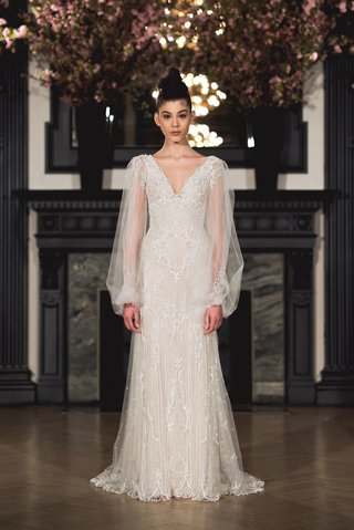 "Mila" by Ines Di Santo ines-di-santo-spring-2019-bridal-collection-wedding-dress-mila-v-neck-long-sleeve-poet-sheath-gown