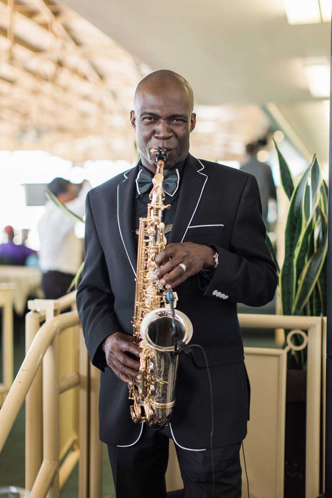 Saxophone Player in Dark Suit