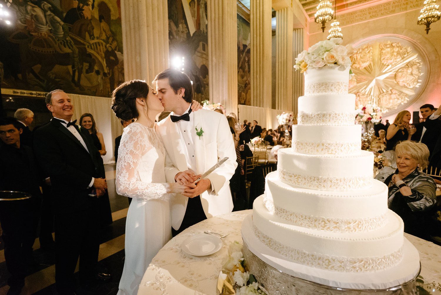 Kiss During NYE Cake Cutting