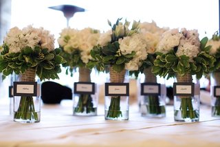 Rustic Bridesmaid Bouquets white-flower-bouquet-with-greenery-in-vases