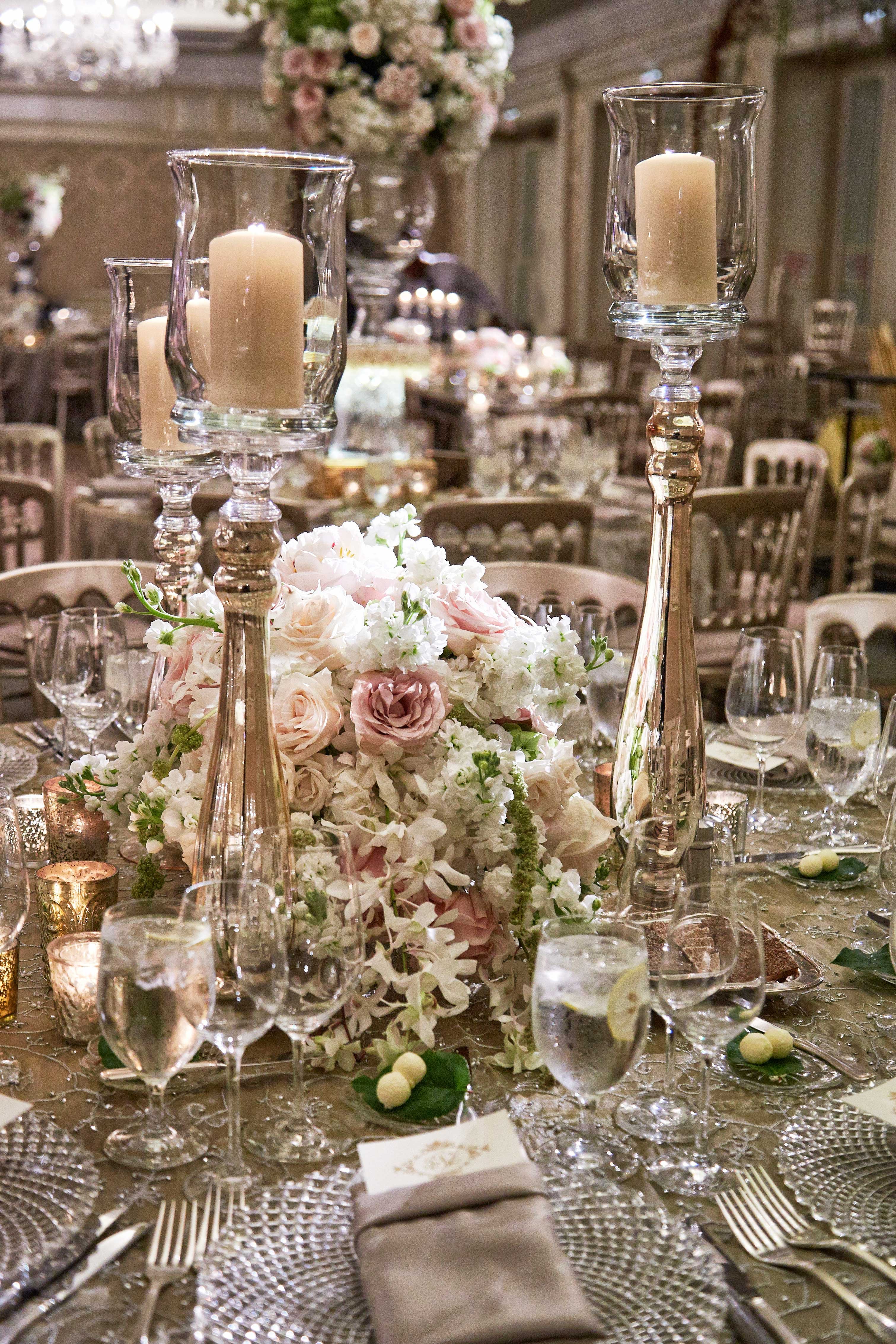 White & Pink Centerpiece on Embroidered Linen