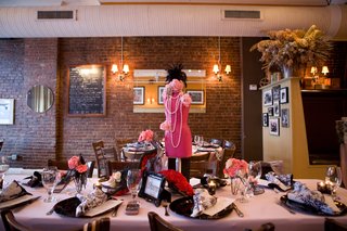 Paris-Themed Bridal Shower Space brick-walls-and-pink-dress-forms