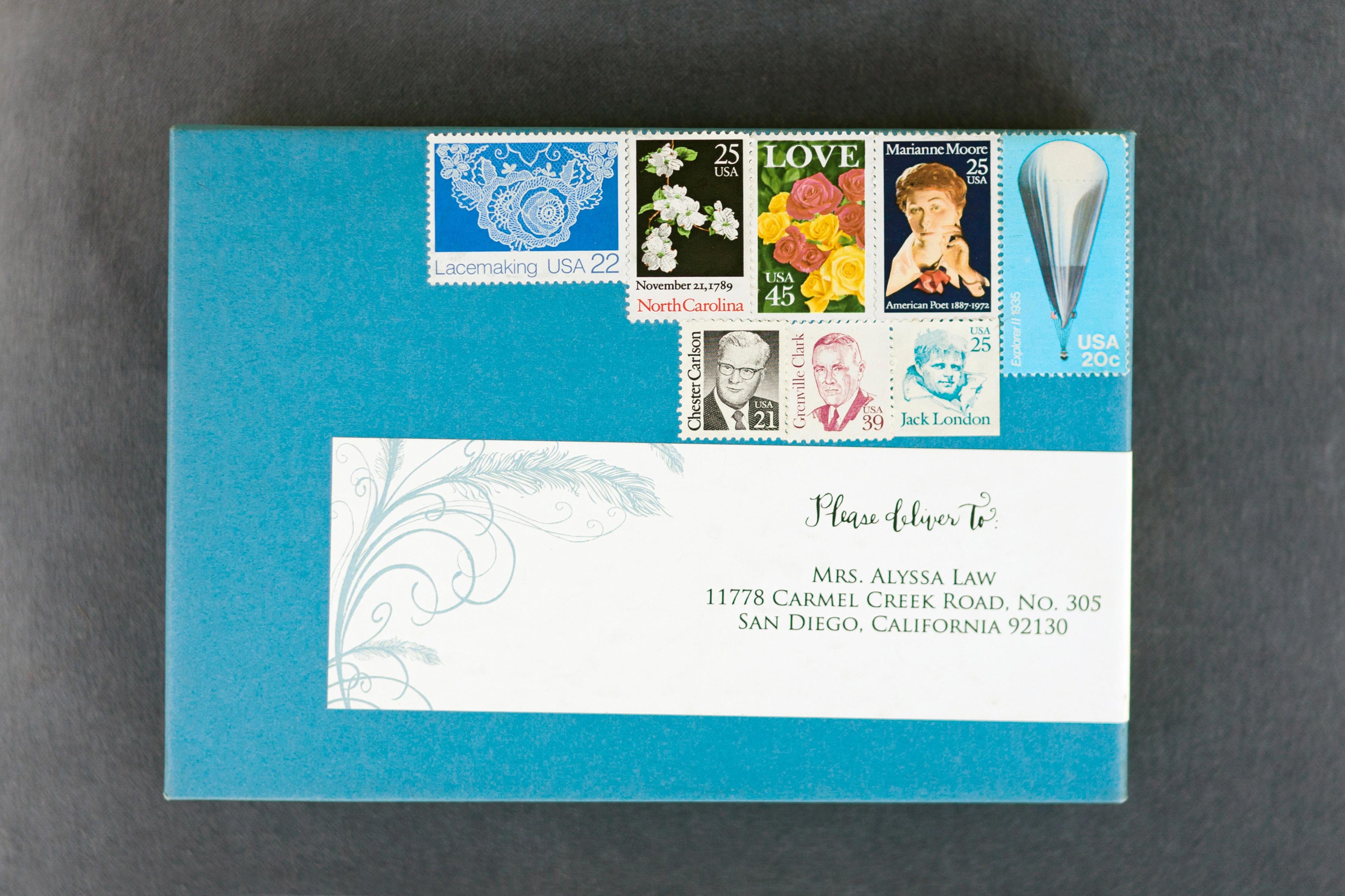 Blue Envelope with Stamps
