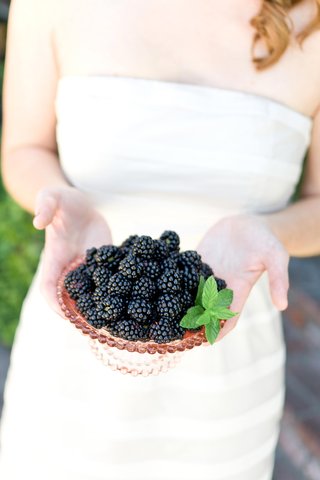 Bowl of Blackberries bride-to-be-holds-bowl-of-fruit