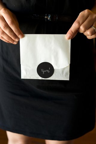 Takeaway Bag with "Yum!" Sticker white-to-go-bag-with-black-sticker