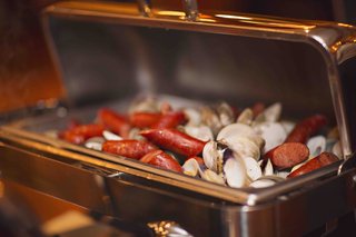 Buffet Steamed Clams silver-buffet-tray-with-sausage-and-clams-for-rehearsal-dinner