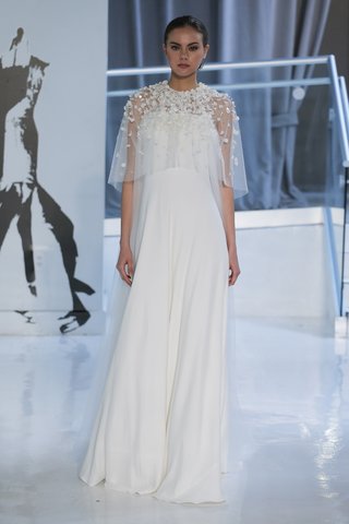"Elvira" by Peter Langner elvira-by-peter-langner-spring-2018-strapless-sheath-gown-crepe-tulle-bodice-cape-floral-embroidery
