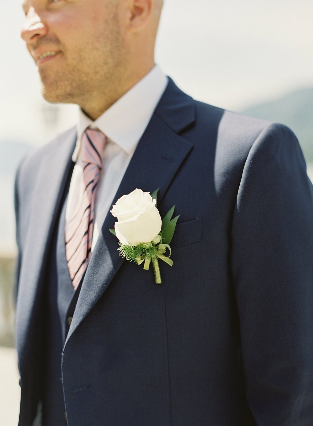 Groom in Navy with White Boutonniere