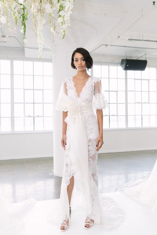 Look 9 by Marchesa Bridal FW18 marchesa-bridal-fall-2018-collection-wedding-dress-v-neck-high-low-lace-gown-flower-sash