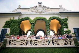 Wedding Guests on Terrace bride-and-groom-with-family-and-friends-on-balcony
