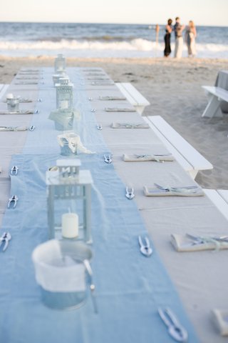 Seaside Clambake Tablescape long-picnic-table-on-beach-sand