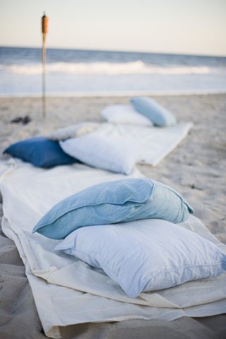 Pillows and Blankets on Beach oceanfront-pillow-and-blanket