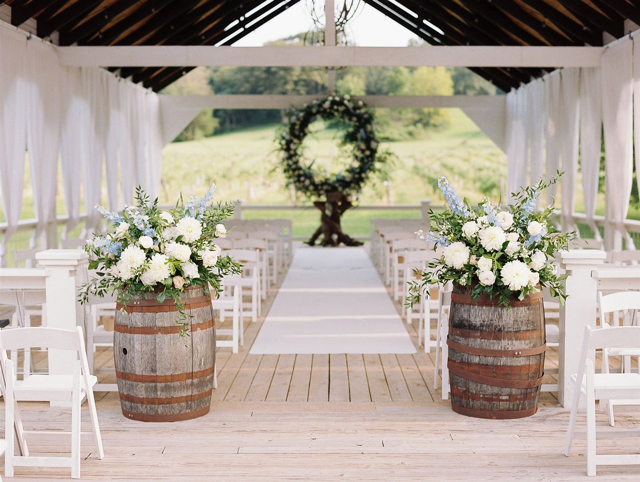 Wine Barrels at Ceremony Entrance