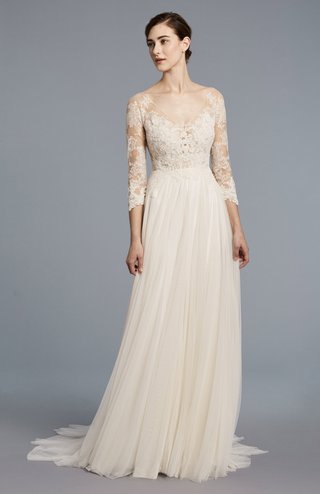 "Ava" by Anne Barge anne-barge-spring-2018-collection-bridal-dress-v-neckline-quarter-sleeve-lace-applique-s-godet-skirt