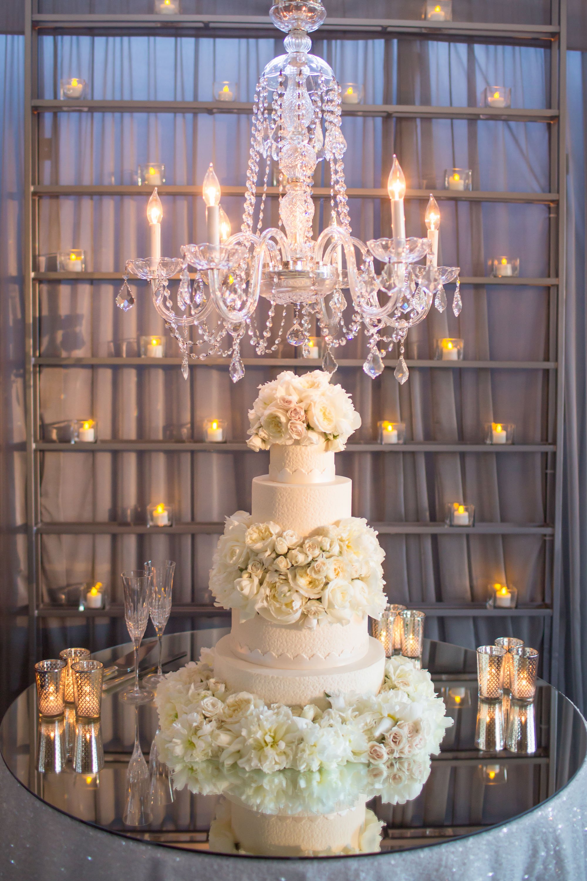 Cake Displayed Under Chandelier