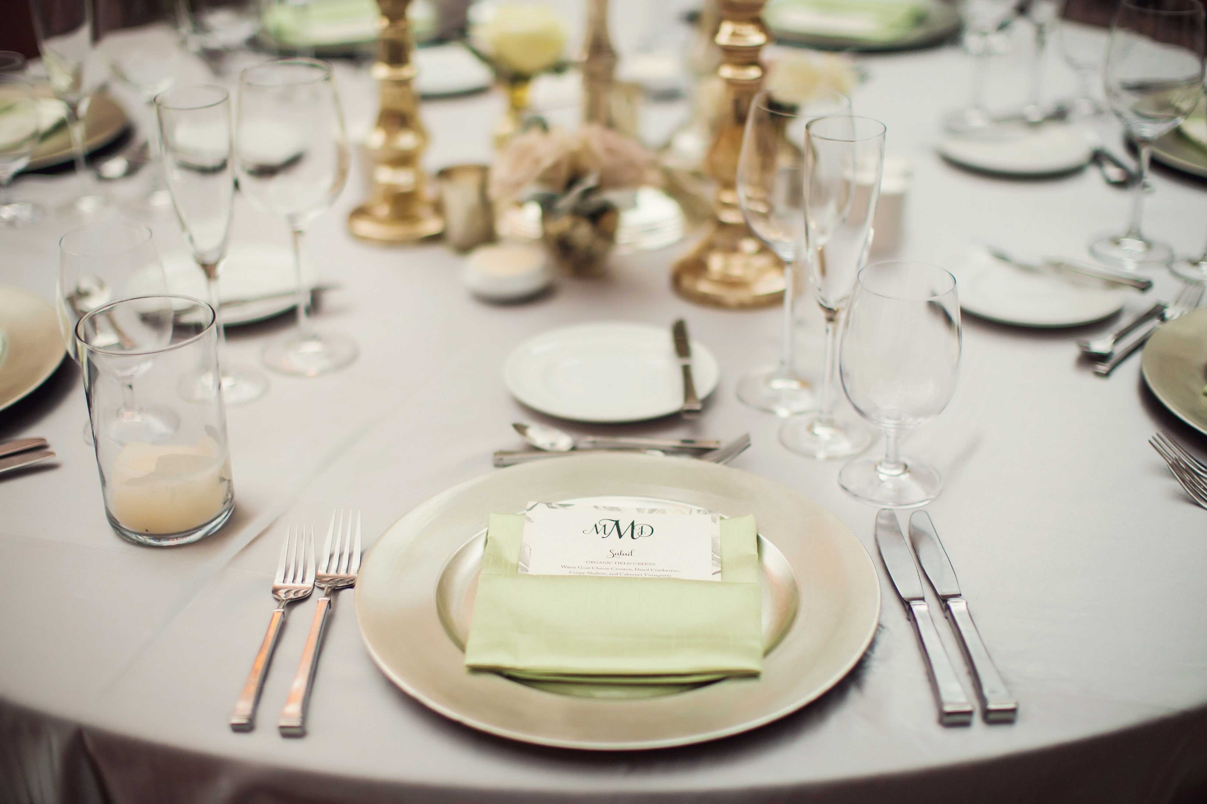 Soft Green Dinner Napkin on Silver Charger