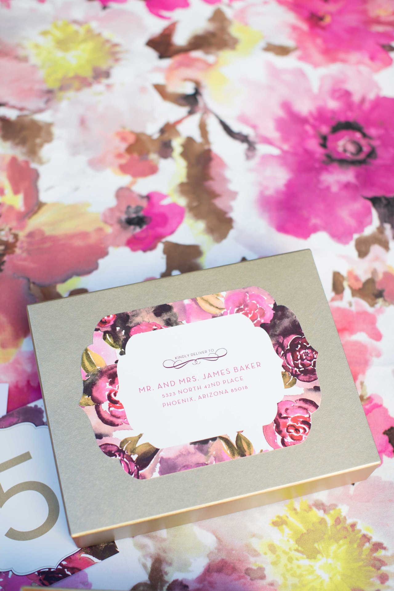 Floral and Gold Paper Products on Table Linen